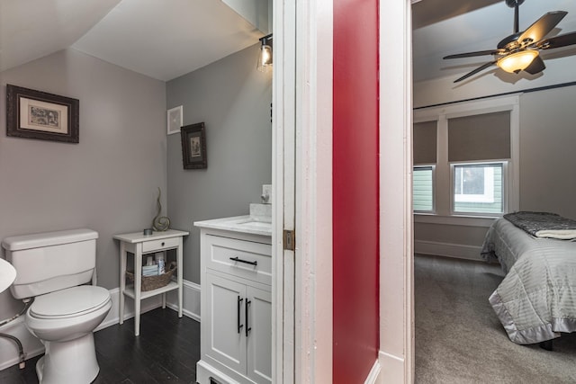 60 Saragossa St, Saint Augustine, FL 32084 - ensuite bathroom with connected bathroom, toilet, visible vents, baseboards, and vaulted ceiling
