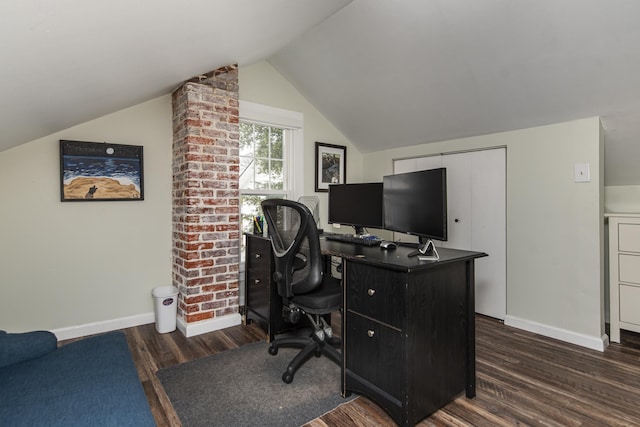 60 Saragossa St, Saint Augustine, FL 32084 - office space with vaulted ceiling, dark wood finished floors, and baseboards