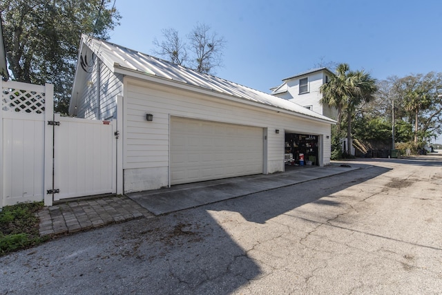 60 Saragossa St, Saint Augustine, FL 32084 - garage featuring a gate and fence