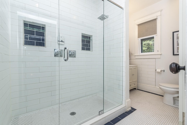 60 Saragossa St, Saint Augustine, FL 32084 - full bathroom featuring a stall shower, tile patterned flooring, and toilet