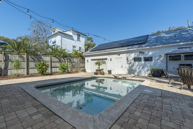 60 Saragossa St, Saint Augustine, FL 32084 - view of pool featuring a patio area, a fenced backyard, and a pool with connected hot tub