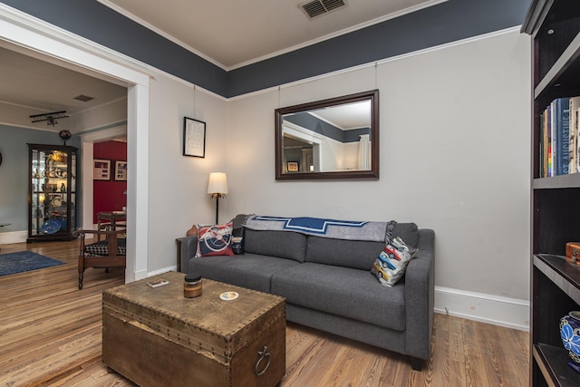 60 Saragossa St, Saint Augustine, FL 32084 - living area with wood finished floors, visible vents, and baseboards