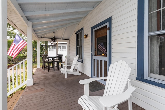 60 Saragossa St, Saint Augustine, FL 32084 - wooden deck with a porch and outdoor dining space