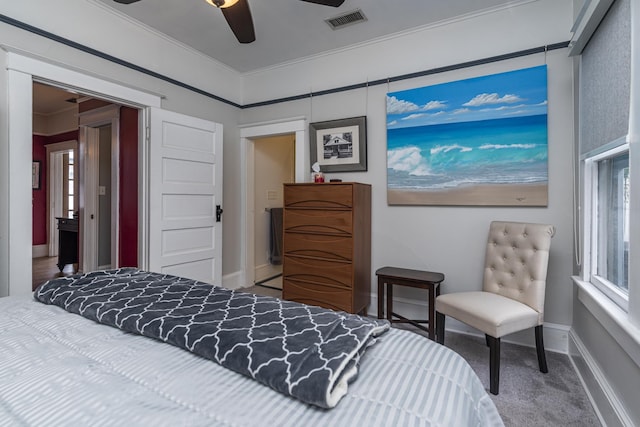 60 Saragossa St, Saint Augustine, FL 32084 - carpeted bedroom featuring visible vents, crown molding, baseboards, and ceiling fan