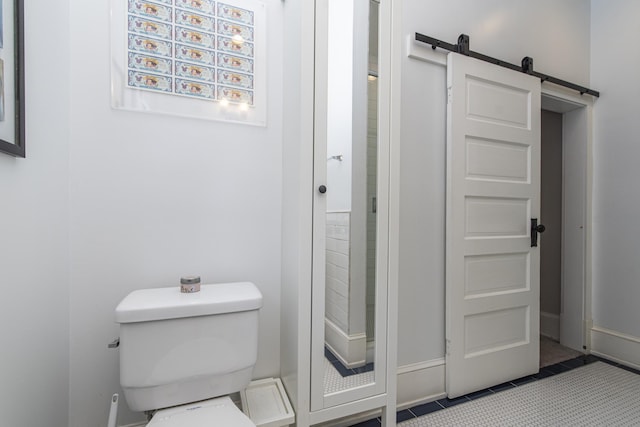 60 Saragossa St, Saint Augustine, FL 32084 - bathroom with toilet and tile patterned floors