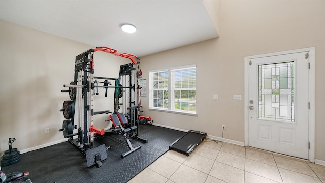 191 Timberwood Dr, Saint Augustine, FL 32084 - exercise room with tile patterned floors and baseboards