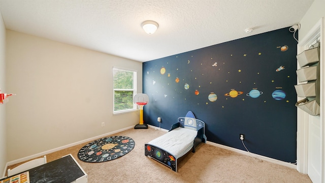 191 Timberwood Dr, Saint Augustine, FL 32084 - bedroom with baseboards, carpet floors, wallpapered walls, and an accent wall