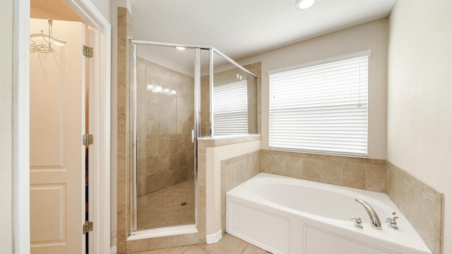 191 Timberwood Dr, Saint Augustine, FL 32084 - bathroom with a bath, tile patterned flooring, and a shower stall