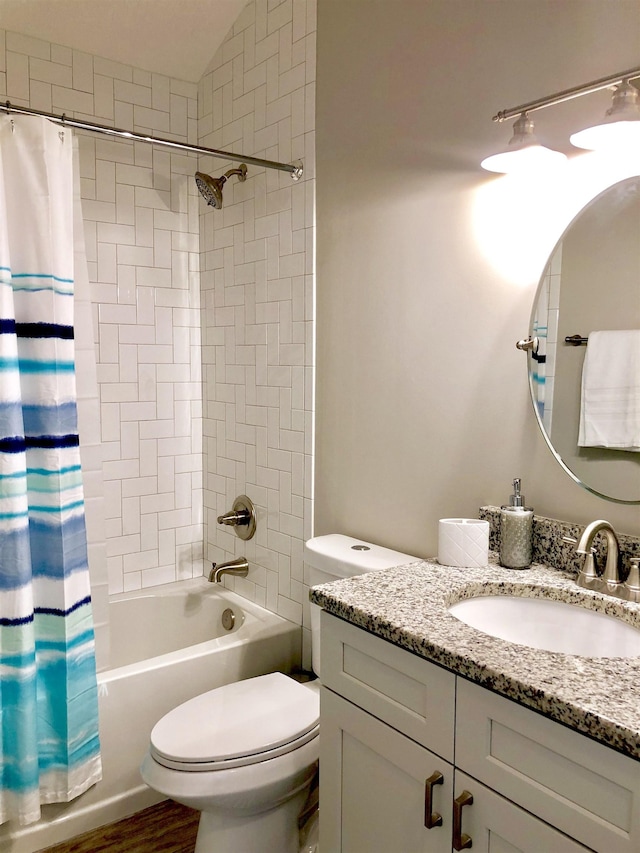 3877 Laurel St, Saint Augustine, FL 32084 - full bathroom featuring vanity, toilet, and shower / bath combo