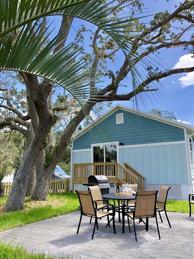 3877 Laurel St, Saint Augustine, FL 32084 - view of patio / terrace with outdoor dining area and a deck