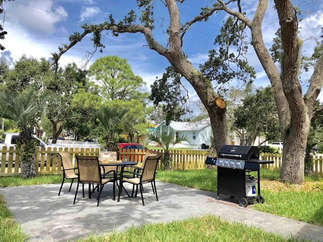 3877 Laurel St, Saint Augustine, FL 32084 - view of patio with grilling area and outdoor dining space
