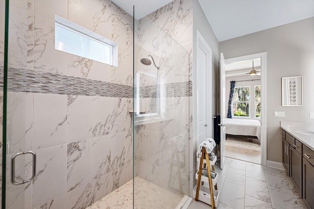 bathroom featuring vanity and a shower with shower door