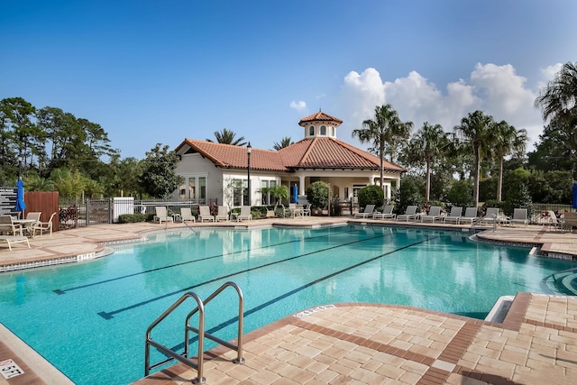 view of swimming pool with a patio area