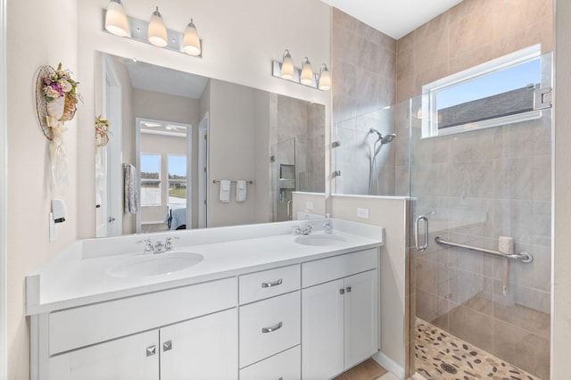 bathroom featuring vanity and walk in shower