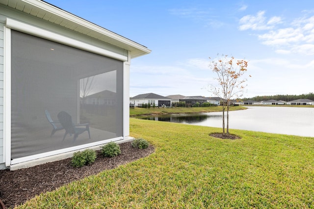 view of yard with a water view