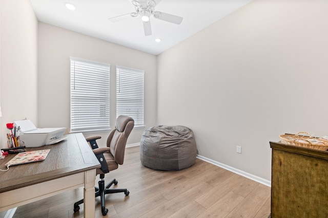 home office featuring ceiling fan and light wood-type flooring