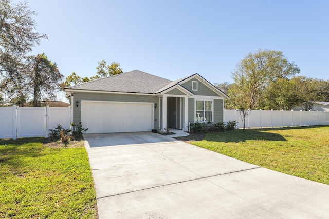 view of front of home featuring a garage, driveway, a gate, and roof with shingles