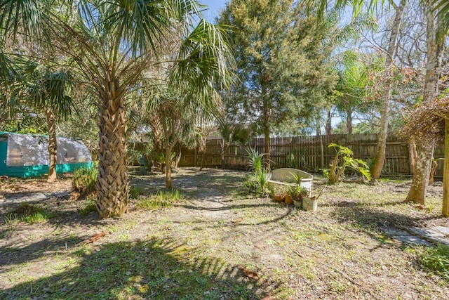 view of yard with fence