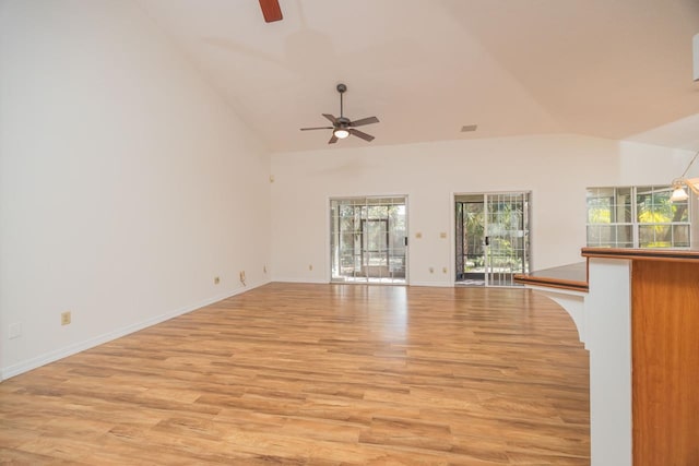 unfurnished living room featuring visible vents, ceiling fan, high vaulted ceiling, light wood-type flooring, and baseboards