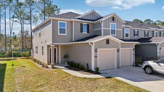 view of front of house featuring a garage and a front yard