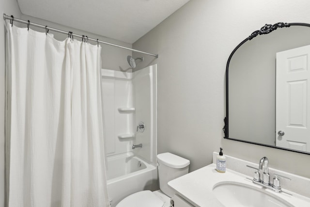 full bathroom featuring vanity, shower / tub combo, and toilet