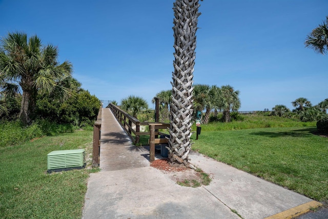 surrounding community featuring a lawn