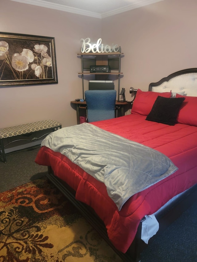 bedroom with ornamental molding and carpet