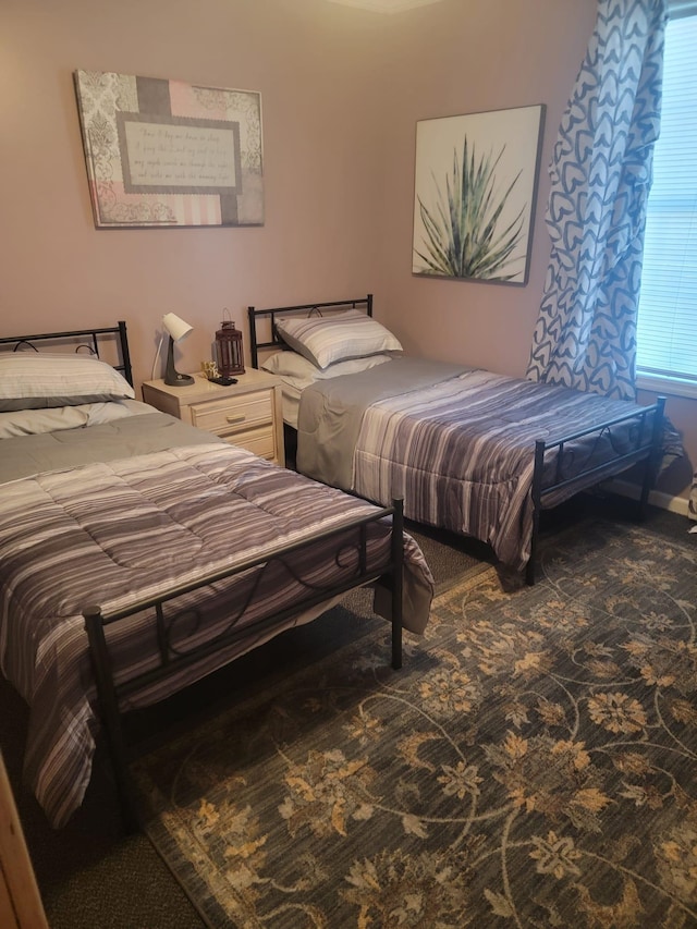 bedroom featuring carpet