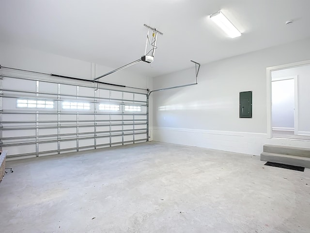 307 Minorca Ave, Saint Augustine, FL 32080 - garage with electric panel and a garage door opener