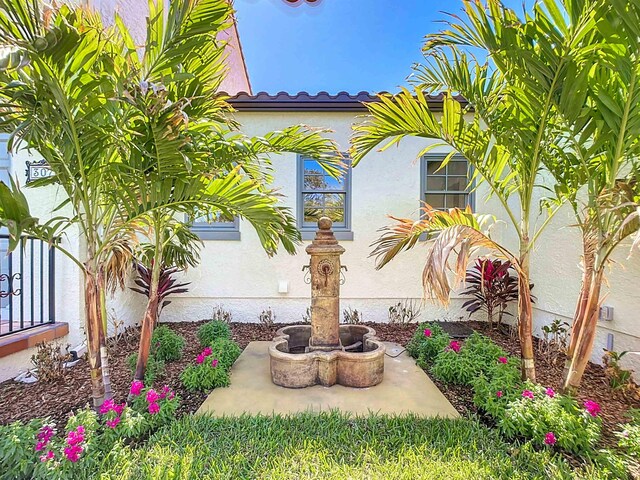 307 Minorca Ave, Saint Augustine, FL 32080 - mediterranean / spanish-style home featuring an attached garage and stucco siding