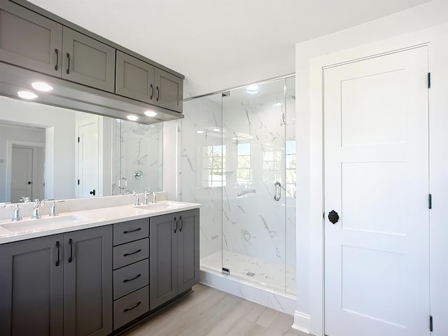 307 Minorca Ave, Saint Augustine, FL 32080 - full bath featuring a marble finish shower, double vanity, and a sink