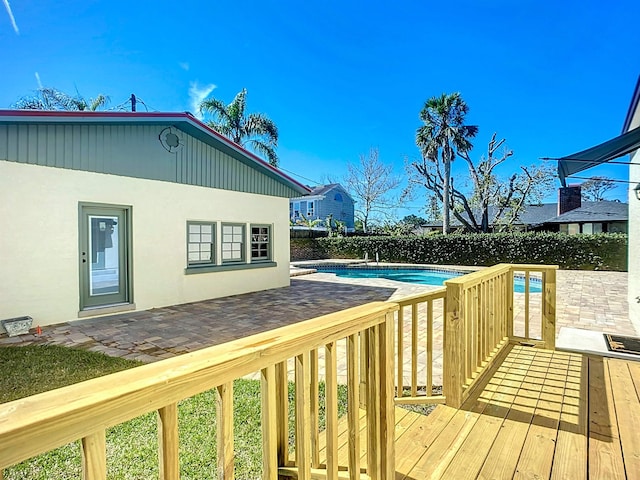 307 Minorca Ave, Saint Augustine, FL 32080 - wooden deck with a fenced in pool and a patio area