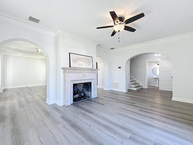 307 Minorca Ave, Saint Augustine, FL 32080 - unfurnished living room with visible vents, a fireplace, and wood finished floors