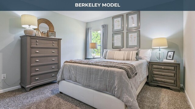 carpeted bedroom featuring baseboards