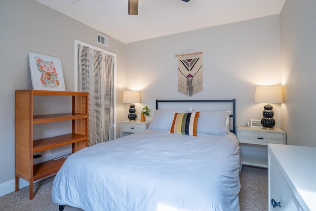 bedroom with carpet flooring, a closet, a ceiling fan, and baseboards
