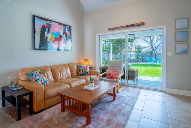 tiled living area with baseboards
