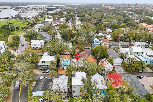 bird's eye view featuring a residential view and a water view