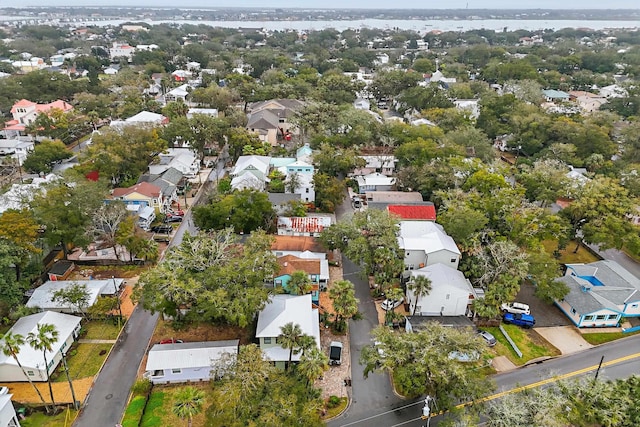 birds eye view of property with a residential view