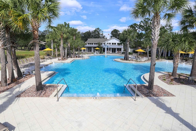 view of pool featuring a patio