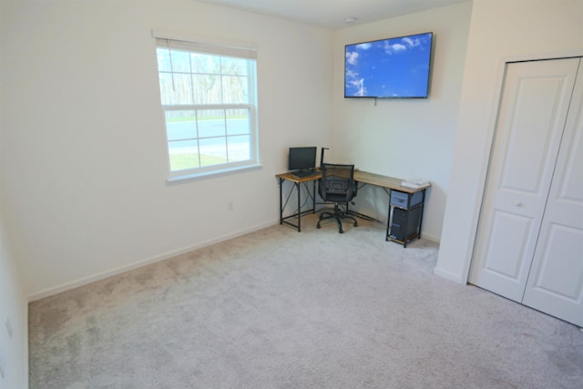 home office featuring light carpet