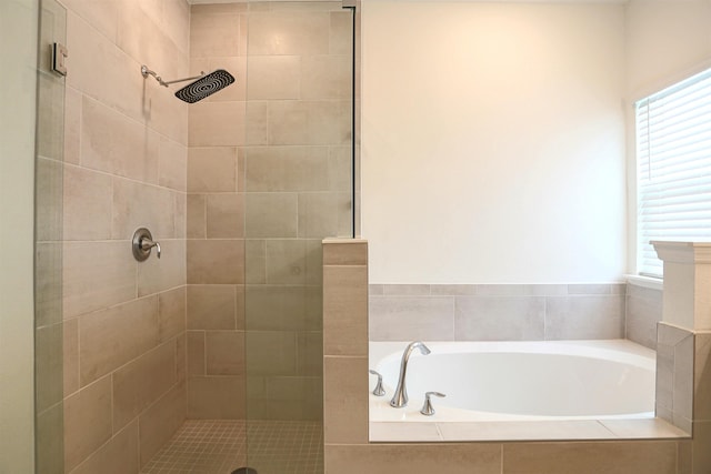 bathroom with independent shower and bath