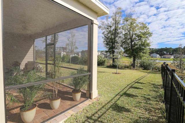 view of yard featuring a sunroom