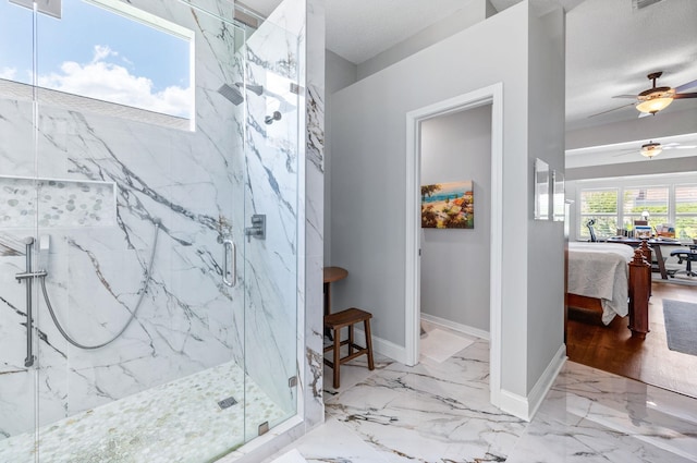 bathroom featuring ceiling fan, a shower with door, a textured ceiling, and hardwood / wood-style flooring