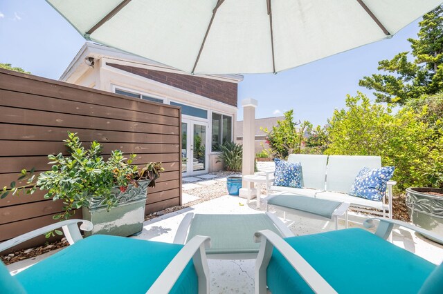 view of patio with outdoor lounge area and french doors