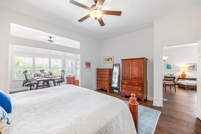 bedroom featuring ceiling fan and dark hardwood / wood-style flooring