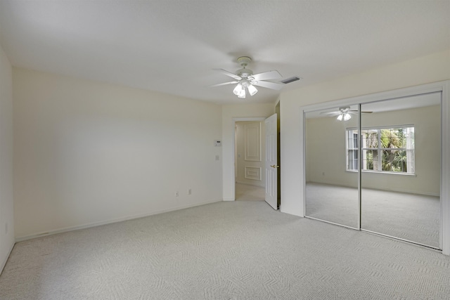 9162 August Cir, Saint Augustine, FL 32080 - unfurnished bedroom with a closet, carpet, and ceiling fan
