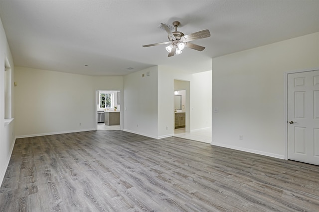 9162 August Cir, Saint Augustine, FL 32080 - unfurnished living room featuring a ceiling fan and wood finished floors