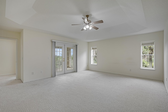 9162 August Cir, Saint Augustine, FL 32080 - unfurnished room featuring a ceiling fan, plenty of natural light, light colored carpet, and french doors
