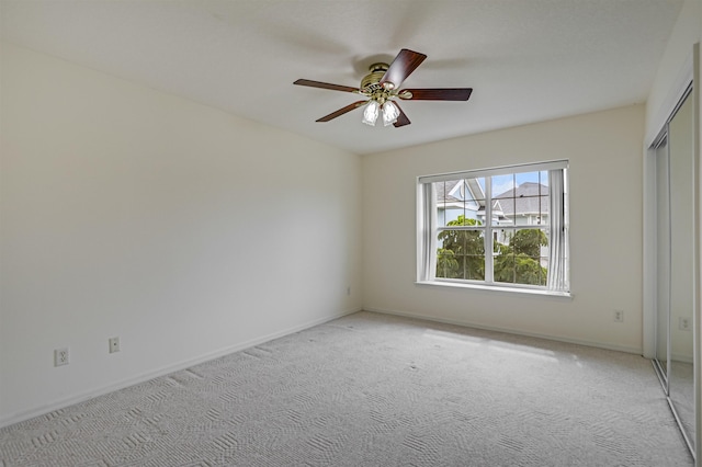 9162 August Cir, Saint Augustine, FL 32080 - empty room with light colored carpet and a ceiling fan