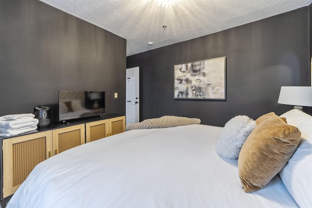 bedroom featuring a textured ceiling